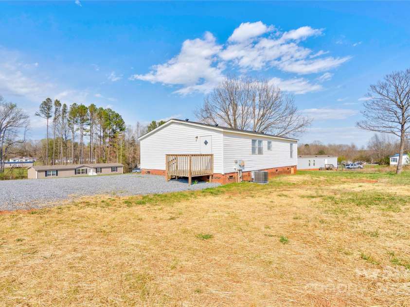 104 Buck Haven Court, Lawndale, NC 28090.  MLS# CAR4239612, YatesRealty ID 2974. Back Left