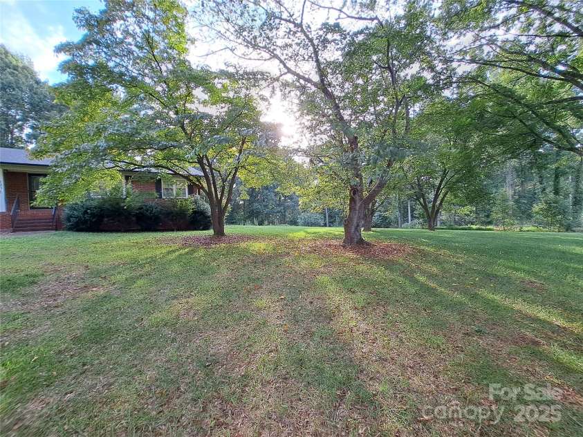 123 Softwind Lane, Concord, NC 28025.  MLS# CAR4296194, YatesRealty ID 2974. Front yard 