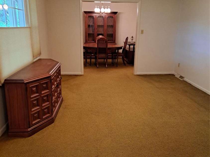 123 Softwind Lane, Concord, NC 28025.  MLS# CAR4296194, YatesRealty ID 2974. Living room to Dining room