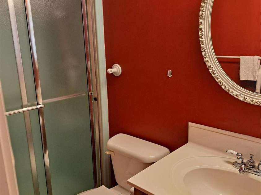 123 Softwind Lane, Concord, NC 28025.  MLS# CAR4296194, YatesRealty ID 2974. Owner's bath with easy access shower