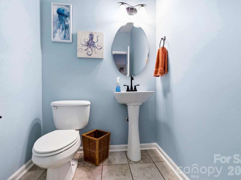 154 Haw River Road, Fletcher, NC 28732.  MLS# CAR4390072, YatesRealty ID 29743. Downstairs 1/2 bath