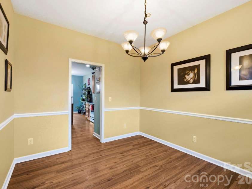 154 Haw River Road, Fletcher, NC 28732.  MLS# CAR4390072, YatesRealty ID 29743. Light filled dining room opens to kitchen