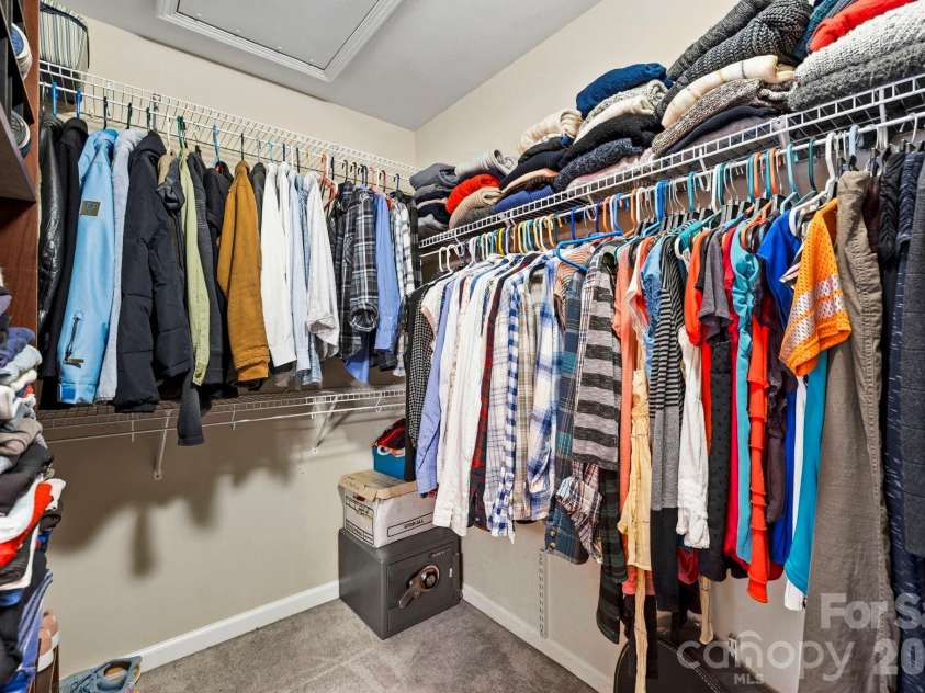 154 Haw River Road, Fletcher, NC 28732.  MLS# CAR4390072, YatesRealty ID 29743. Walk in closet with attic access
