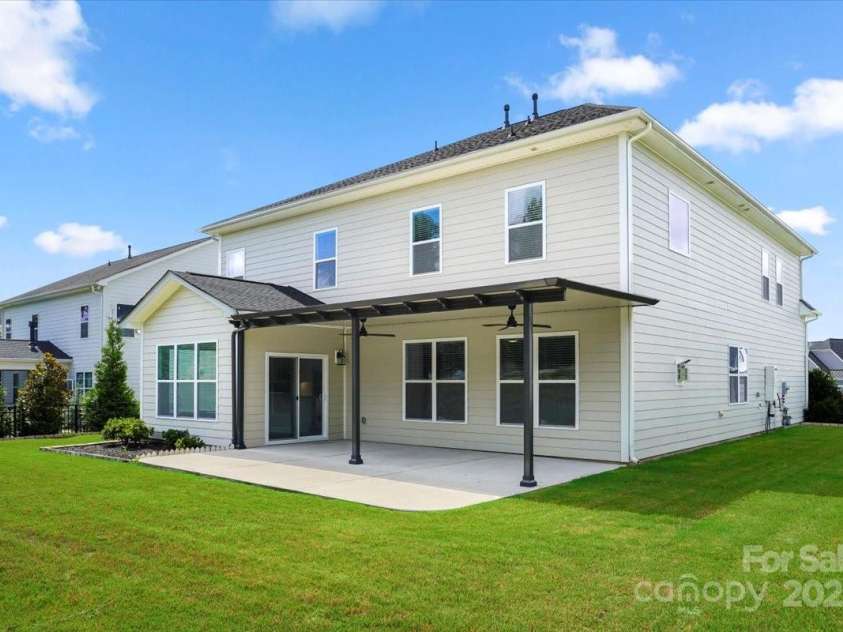 8310 Sandstone Crest Lane, Indian Land, SC 29707.  MLS# CAR4232992, YatesRealty ID 29744. BACKYARD 