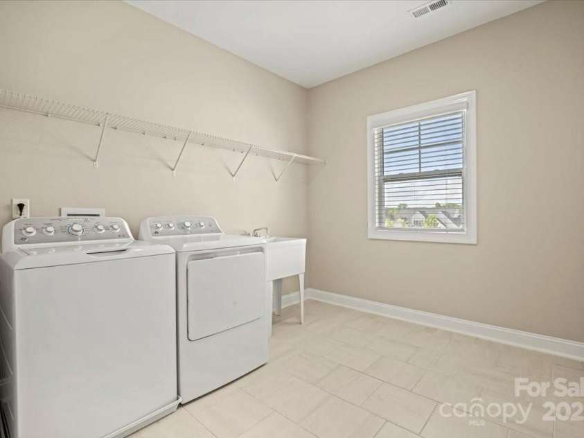 8310 Sandstone Crest Lane, Indian Land, SC 29707.  MLS# CAR4232992, YatesRealty ID 29744. LAUNDRY ROOM: Spacious