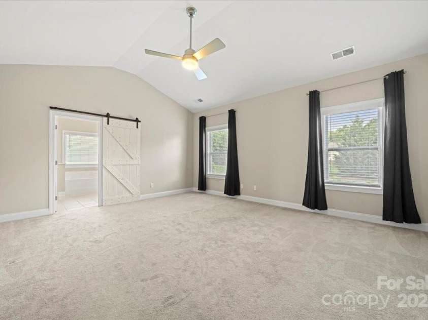 8310 Sandstone Crest Lane, Indian Land, SC 29707.  MLS# CAR4232992, YatesRealty ID 29744. MAIN BEDROOM / UPSTAIRS