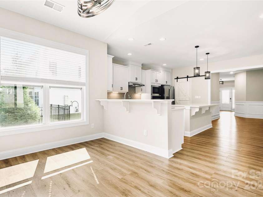 8310 Sandstone Crest Lane, Indian Land, SC 29707.  MLS# CAR4232992, YatesRealty ID 29744. SUNROOM / KITCHEN