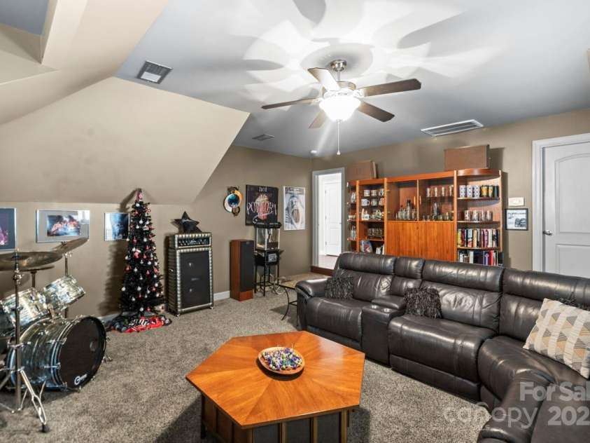 7365 Gabriel Street, Sherrills Ford, NC 28673.  MLS# CAR4253756, YatesRealty ID 29745. Media room (door leads to attic storage)