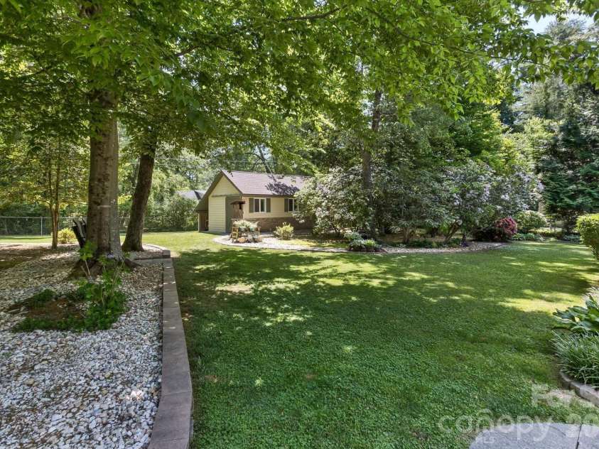 29 Greenwood Forest Drive, Etowah, NC 28729.  MLS# CAR4382718, YatesRealty ID 29748. Backyar and Workshop