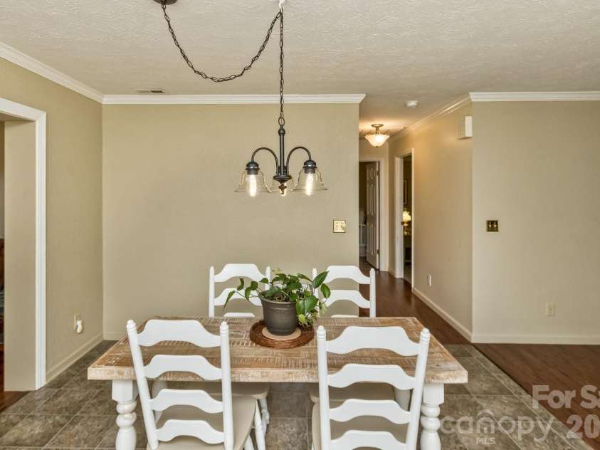 29 Greenwood Forest Drive, Etowah, NC 28729.  MLS# CAR4382718, YatesRealty ID 29748. Dining room