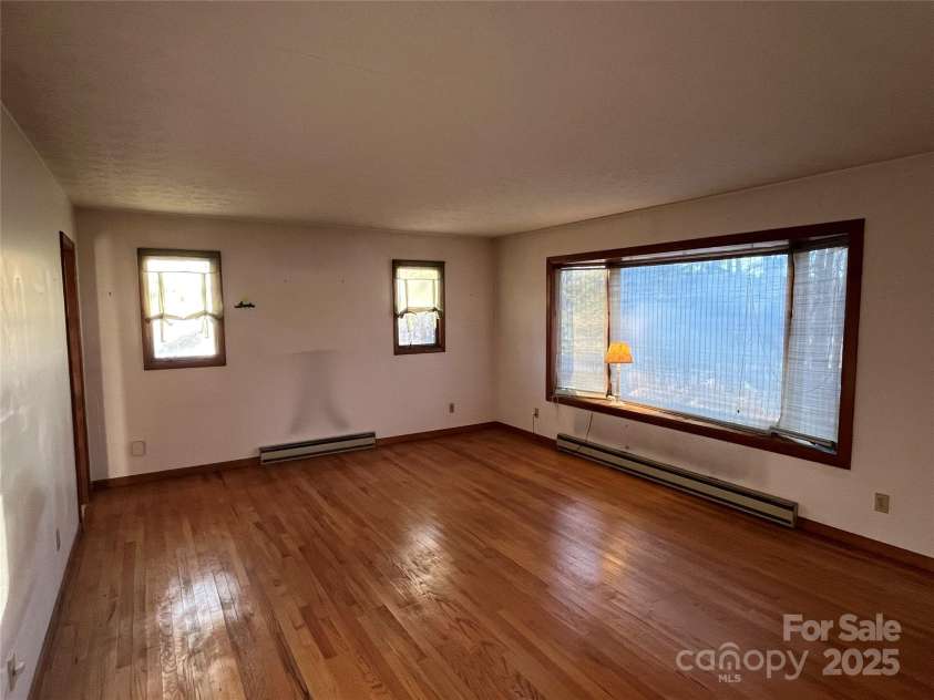 794 New Haw Creek Road, Asheville, NC 68805.  MLS# CAR4224115, YatesRealty ID 2975. 