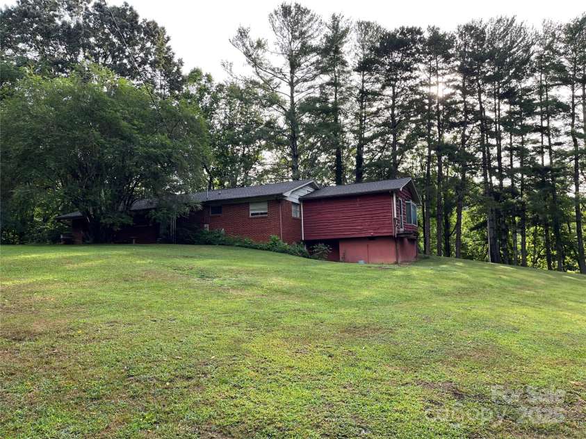 794 New Haw Creek Road, Asheville, NC 68805.  MLS# CAR4224115, YatesRealty ID 2975. 
