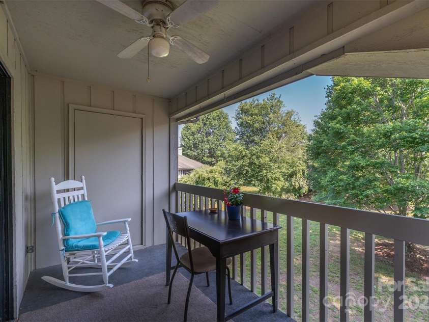 806 Abbey Circle, Asheville, NC 28805.  MLS# CAR4274112, YatesRealty ID 29751. Extra storage off of deck