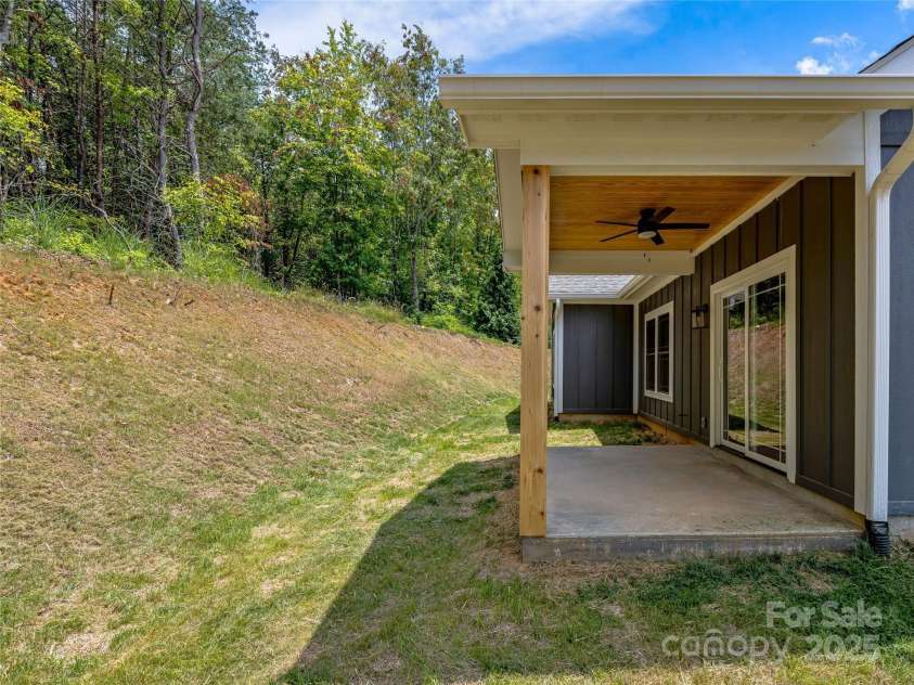 297 Bethany Drive, Mars Hill, NC 28754.  MLS# CAR4277821, YatesRealty ID 2976. Back Yard View - Covered Back Patio - Tongue & Groove Ceiling - Ceiling Fan