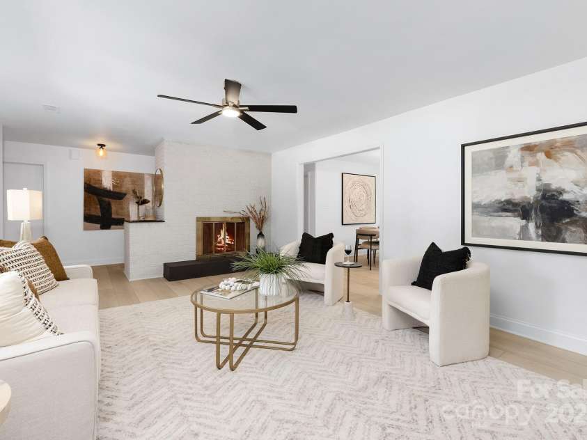 605 Magnolia Street, Mooresville, NC 28115.  MLS# CAR4282553, YatesRealty ID 29760. Gorgeous gas fireplace with tiled hearth