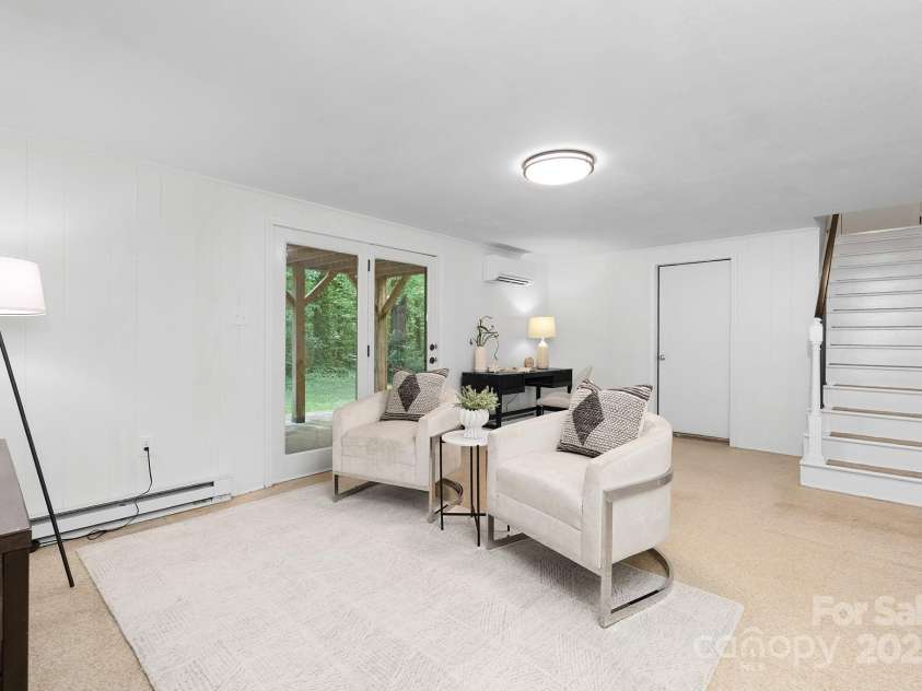 605 Magnolia Street, Mooresville, NC 28115.  MLS# CAR4282553, YatesRealty ID 29760. Second living room in basement