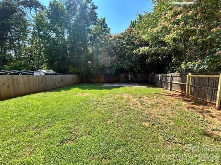 821 Lakehill Road, Charlotte, NC 28214.  MLS# CAR4392404, YatesRealty ID 29762. Backyard