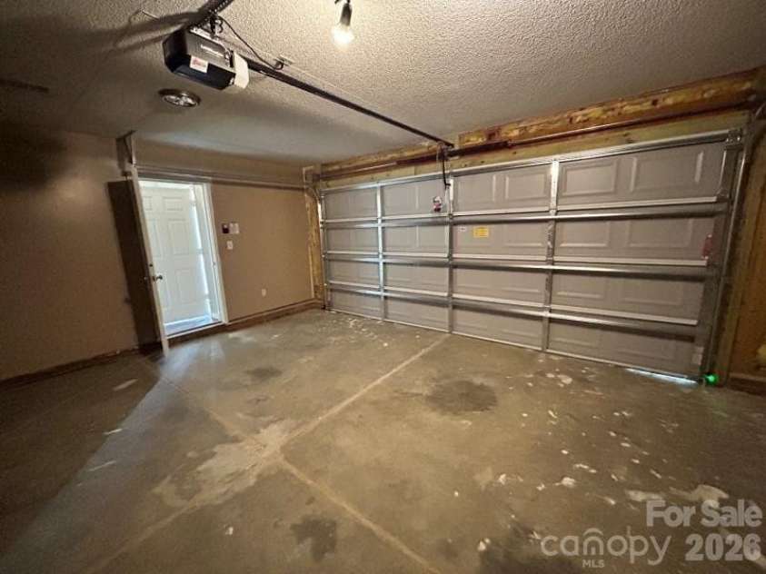 821 Lakehill Road, Charlotte, NC 28214.  MLS# CAR4392404, YatesRealty ID 29762. Garage