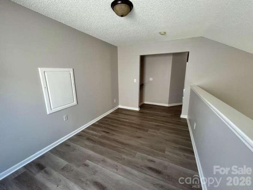 821 Lakehill Road, Charlotte, NC 28214.  MLS# CAR4392404, YatesRealty ID 29762. Loft