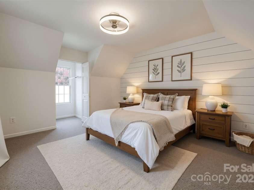 7801 Bella Vista Court, Charlotte, NC 28216.  MLS# CAR4285247, YatesRealty ID 29767. VIRTUAL STAGING of Bedroom showing potential staging of furniture and addition of Shiplap to one wall.