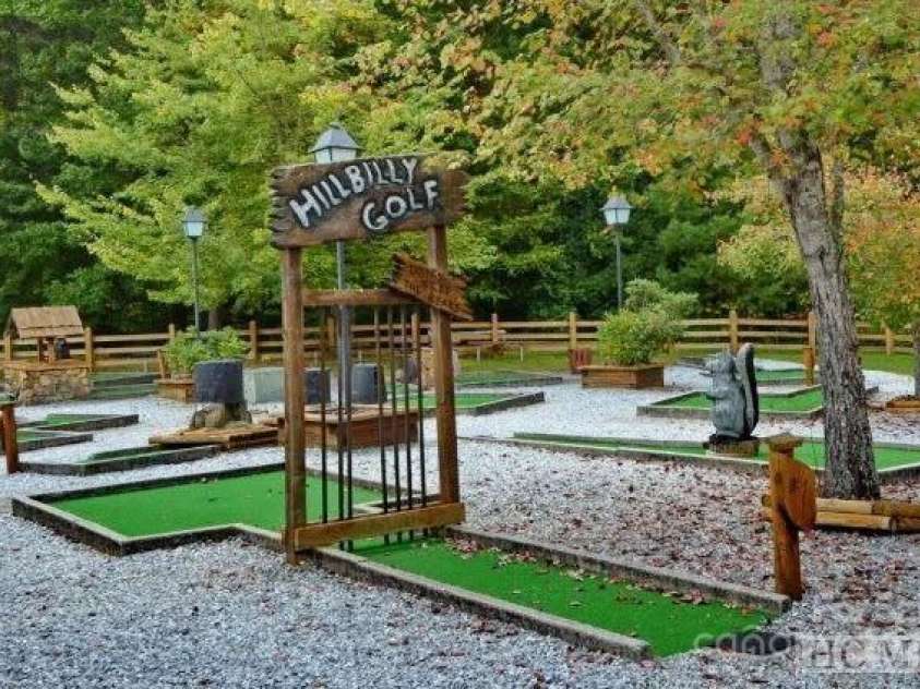 557 Country Club Estates Drive, Sapphire, NC 28774.  MLS# CAR4302980, YatesRealty ID 2977. Sapphire Valley Clubhouse MiniGolf Available