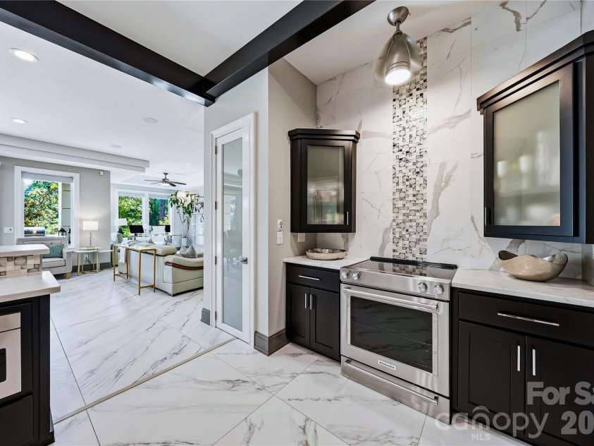 106 Norcross Lane, Mooresville, NC 28117.  MLS# CAR4392261, YatesRealty ID 29774. Secondary Full Kitchen on Lower Level