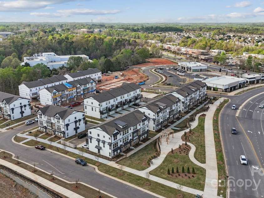 3110 Stelfox Street, Charlotte, NC 28262.  MLS# CAR4260118, YatesRealty ID 29777. Senata at Research Park Community Aerial View