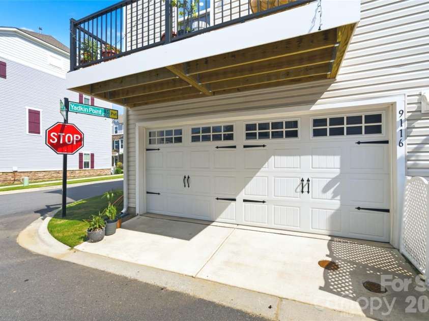 9116 Mallard Mills Drive, Charlotte, NC 28262.  MLS# CAR4392847, YatesRealty ID 29779. Large two car garage