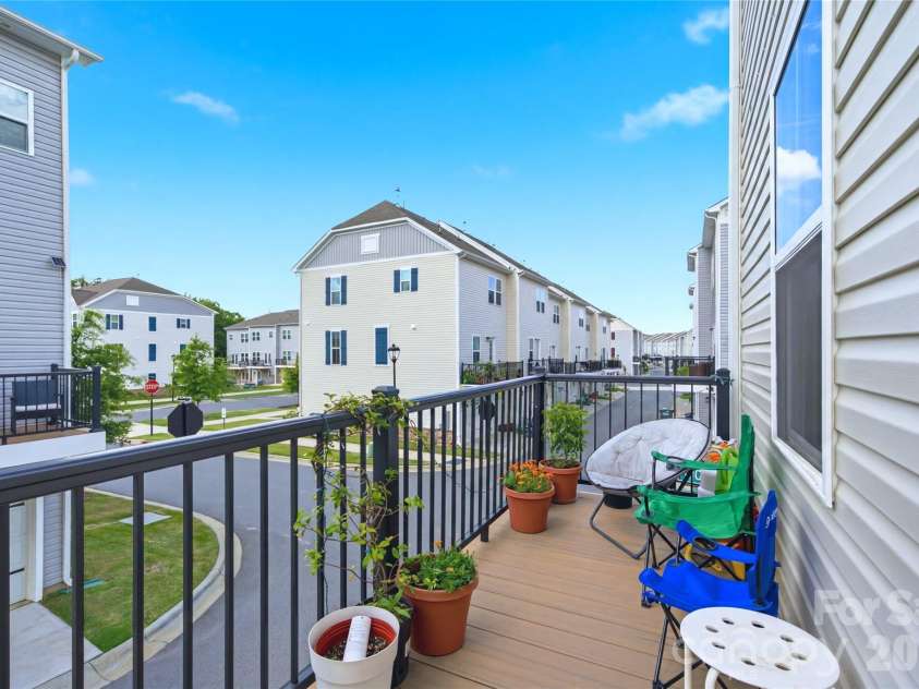 9116 Mallard Mills Drive, Charlotte, NC 28262.  MLS# CAR4392847, YatesRealty ID 29779. Patio off kitchen/2nd floor