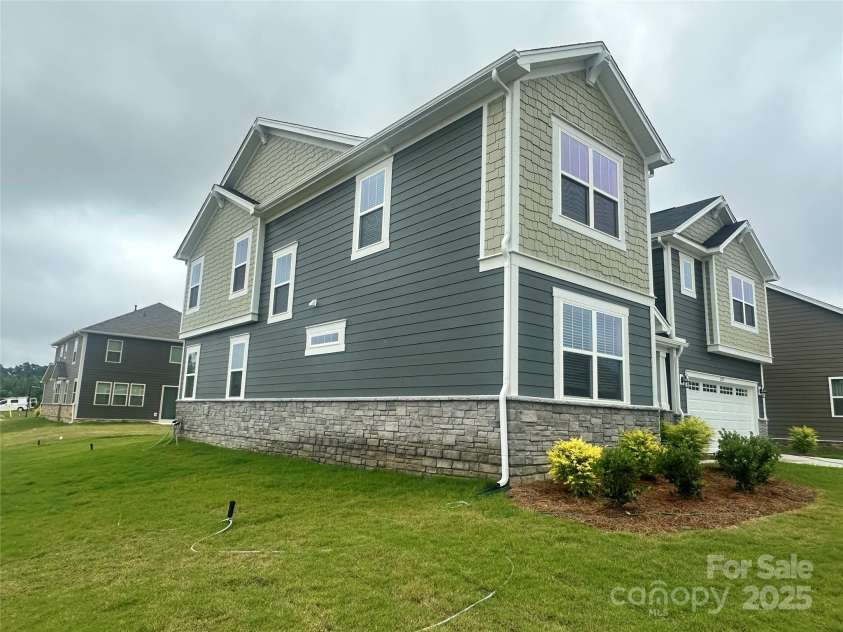 2505 Crimson Way, Monroe, NC 28112.  MLS# CAR4279959, YatesRealty ID 29780. Corner lot side enhanced elevation