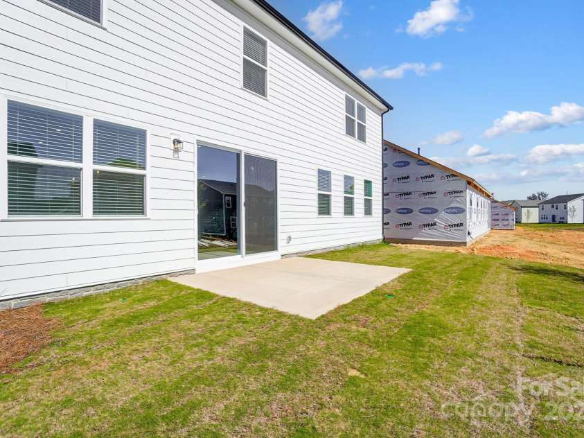 2505 Crimson Way, Monroe, NC 28112.  MLS# CAR4279959, YatesRealty ID 29780. Representative back patio
