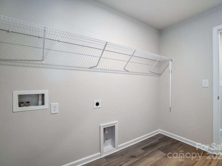 2505 Crimson Way, Monroe, NC 28112.  MLS# CAR4279959, YatesRealty ID 29780. Representative laundry room
