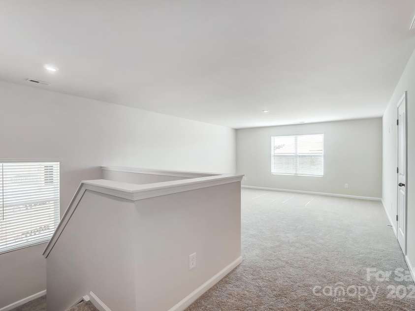 2505 Crimson Way, Monroe, NC 28112.  MLS# CAR4279959, YatesRealty ID 29780. Representative loft