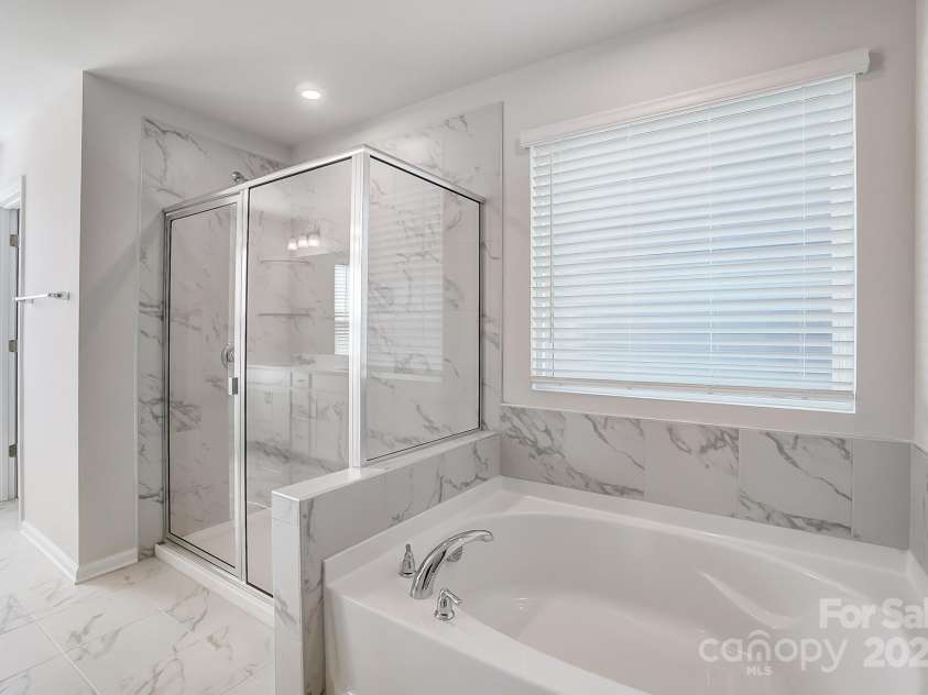 2505 Crimson Way, Monroe, NC 28112.  MLS# CAR4279959, YatesRealty ID 29780. Representative primary bath
