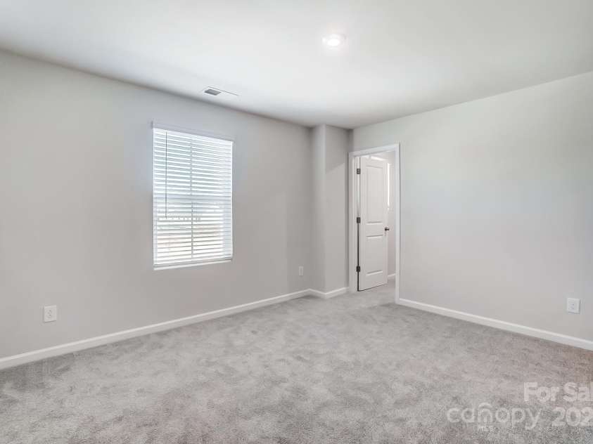 2505 Crimson Way, Monroe, NC 28112.  MLS# CAR4279959, YatesRealty ID 29780. Representative secondary bedroom