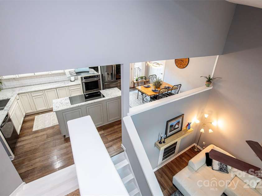 16065 Taku Court, Tega Cay, SC 29708.  MLS# CAR4284887, YatesRealty ID 29782. Kitchen from Upstairs
