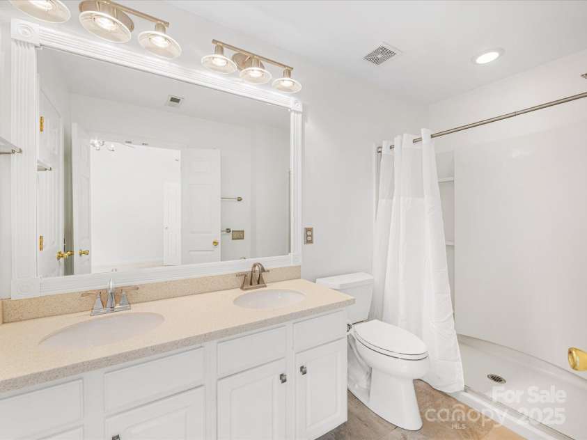 6913 Rothchild Drive, Charlotte, NC 28270.  MLS# CAR4278243, YatesRealty ID 29783. Primary bath updated