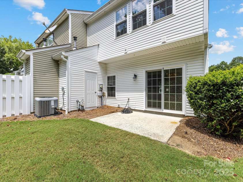 6913 Rothchild Drive, Charlotte, NC 28270.  MLS# CAR4278243, YatesRealty ID 29783. Rear of home - end unit!
