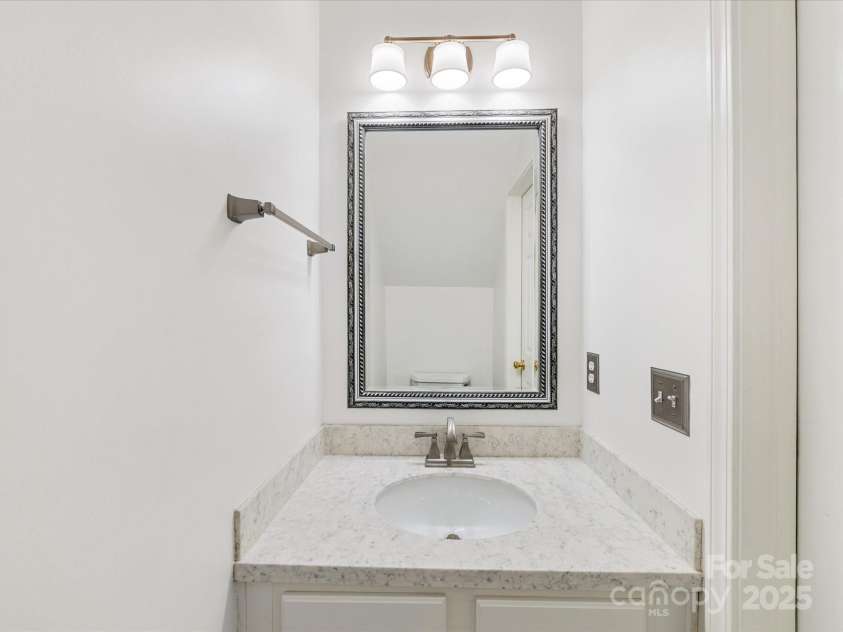 6913 Rothchild Drive, Charlotte, NC 28270.  MLS# CAR4278243, YatesRealty ID 29783. Updated powder room