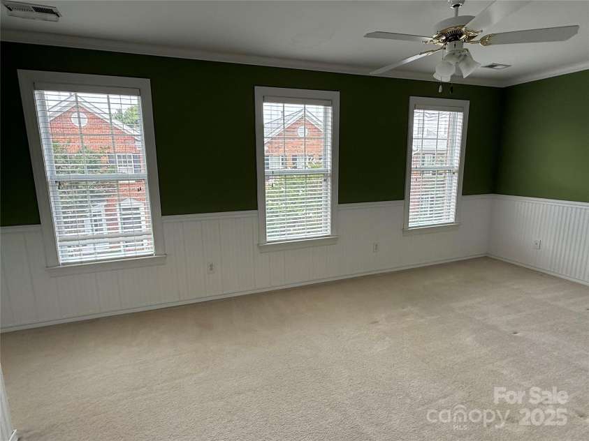 9177 Bonnie Briar Circle, Charlotte, NC 28277.  MLS# CAR4267852, YatesRealty ID 29784. Large 2nd bedroom w/ beadboard trim and windows for natural light