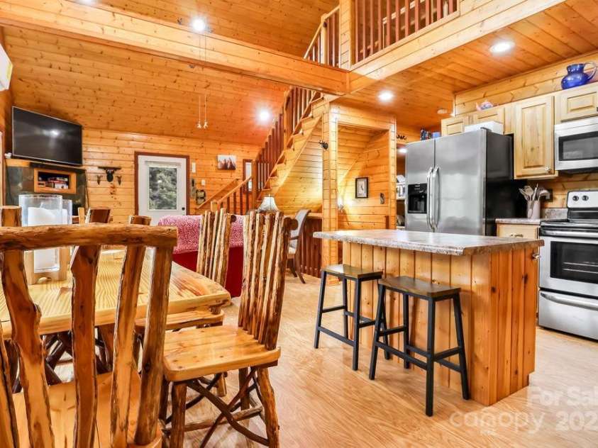 4271 Old Field Creek Road, Grassy Creek, NC 28631.  MLS# CAR4284275, YatesRealty ID 2979. Dining Room and Kitchen