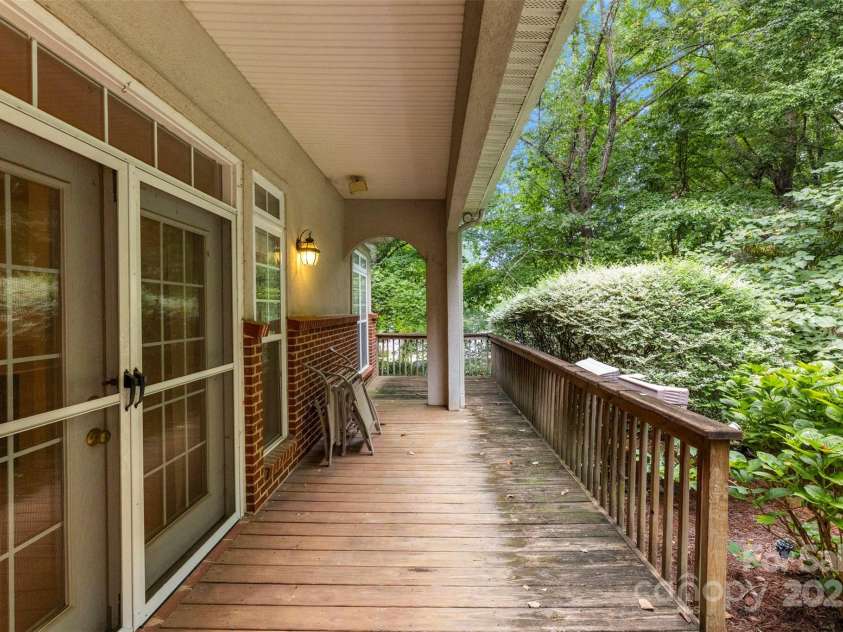 8820 Legacy Lake Lane, Charlotte, NC 28269.  MLS# CAR4283739, YatesRealty ID 29791. Back porch