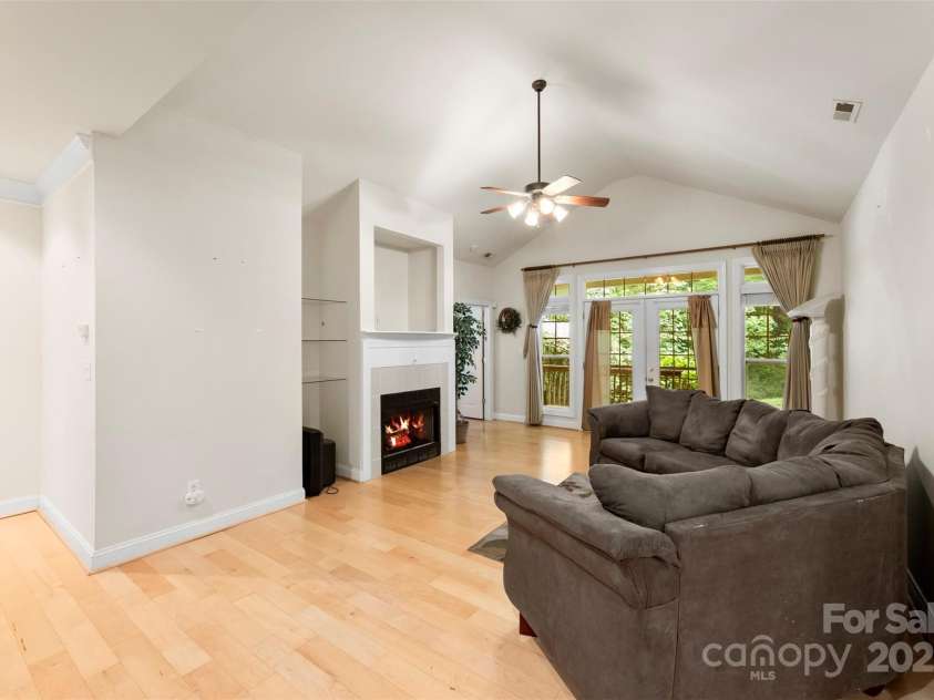 8820 Legacy Lake Lane, Charlotte, NC 28269.  MLS# CAR4283739, YatesRealty ID 29791. Living Room