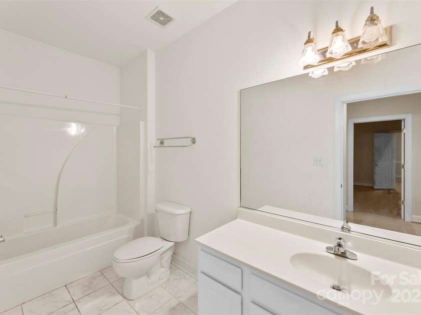 8820 Legacy Lake Lane, Charlotte, NC 28269.  MLS# CAR4283739, YatesRealty ID 29791. Second Bathroom