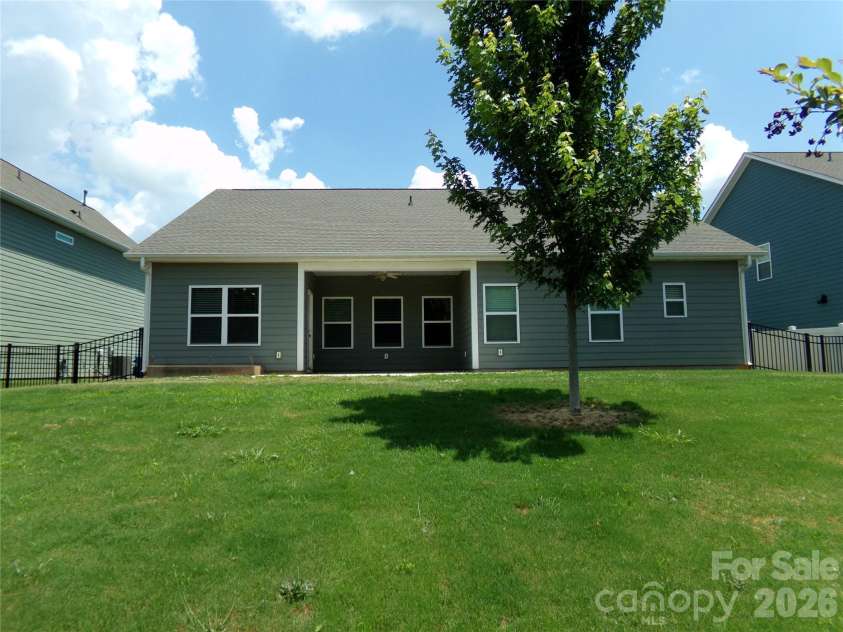 517 Ardsley Drive, Locust, NC 28097.  MLS# CAR4392653, YatesRealty ID 29798. Back yard