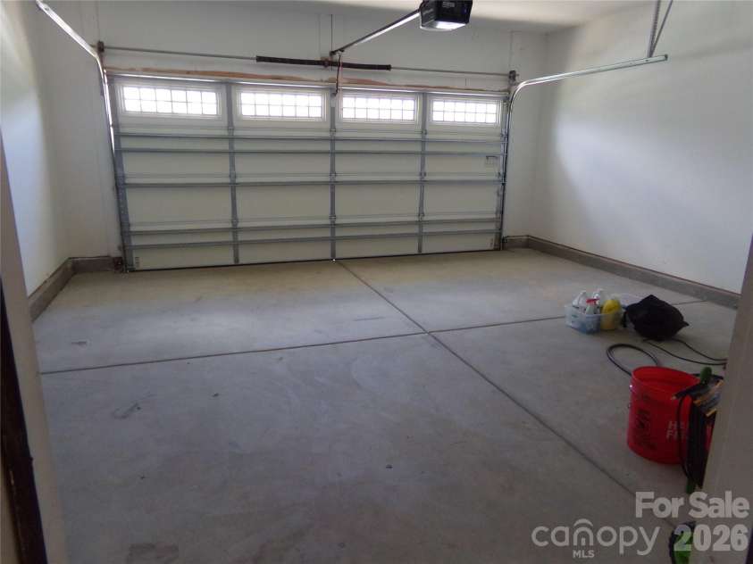 517 Ardsley Drive, Locust, NC 28097.  MLS# CAR4392653, YatesRealty ID 29798. Garage interior