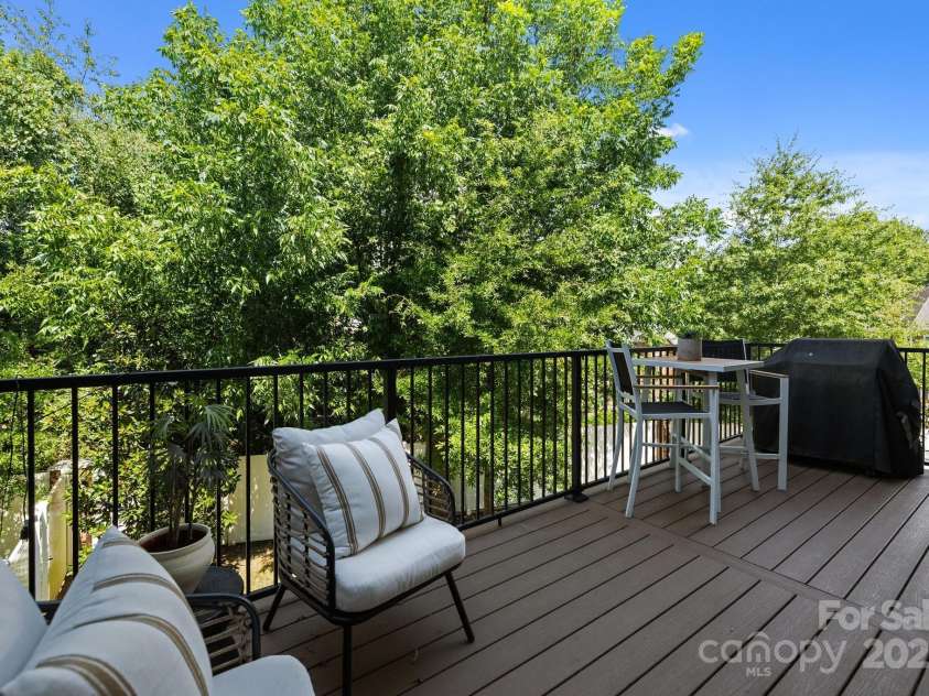 7919 Rea View Court, Charlotte, NC 28226.  MLS# CAR4279811, YatesRealty ID 29798. A chic end unit with a spacious balcony.