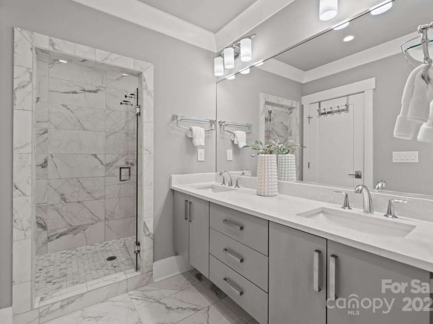 7919 Rea View Court, Charlotte, NC 28226.  MLS# CAR4279811, YatesRealty ID 29798. Deep walk in glass-enclosed shower