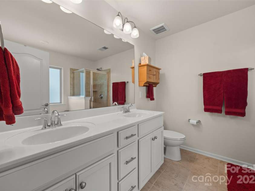 2013 Ice Lake Court, Fort Mill, SC 29715.  MLS# CAR4285965, YatesRealty ID 29802. Primary Bathroom