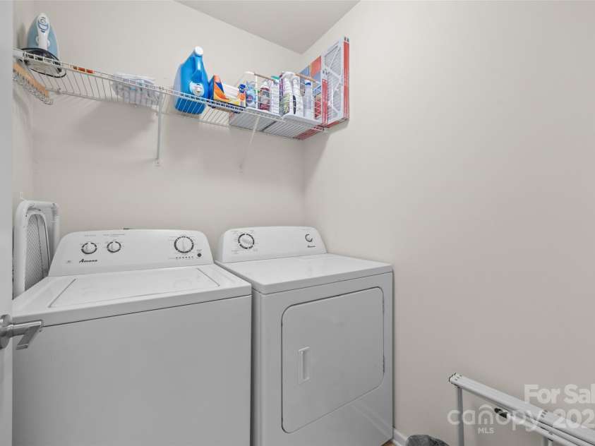 2013 Ice Lake Court, Fort Mill, SC 29715.  MLS# CAR4285965, YatesRealty ID 29802. Upstairs Laundry Room